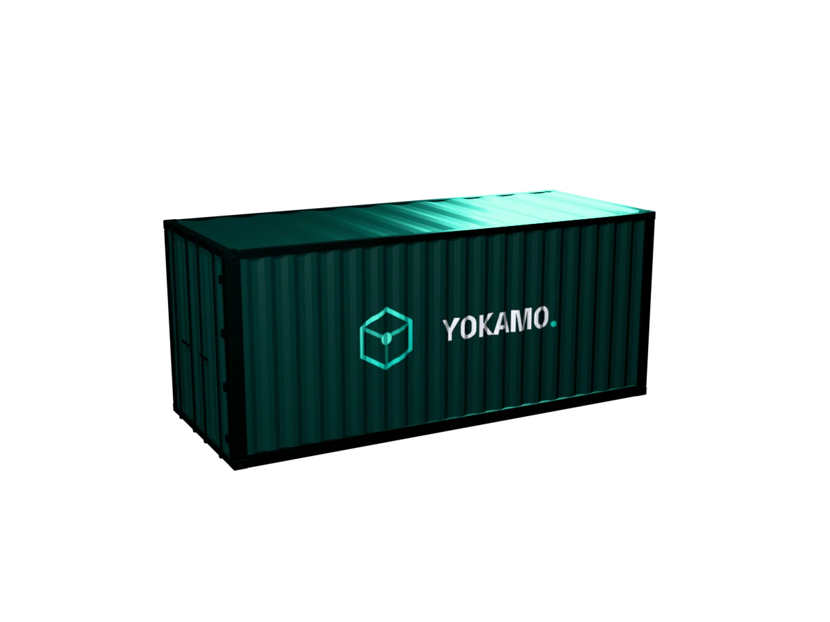 A dark teal 20-foot container with the YOKAMO logo on its side